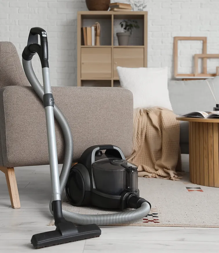 Nettoyage de maison à Étréchy, aspirateur dans un salon propre et lumineux